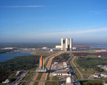 The STS-36 stack rolls out of the Vehicle Assembly Building (VAB), bound for the pad. Photo Credit: NASA, via Joachim Becker/SpaceFacts.de