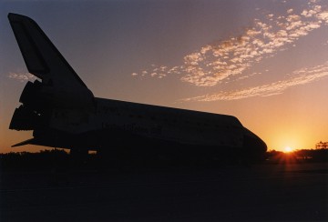 As dusk fell on Discovery after her return from the Near-Mir mission, so a new day dawned for the shuttle-Mir and ISS eras. Photo Credit: NASA