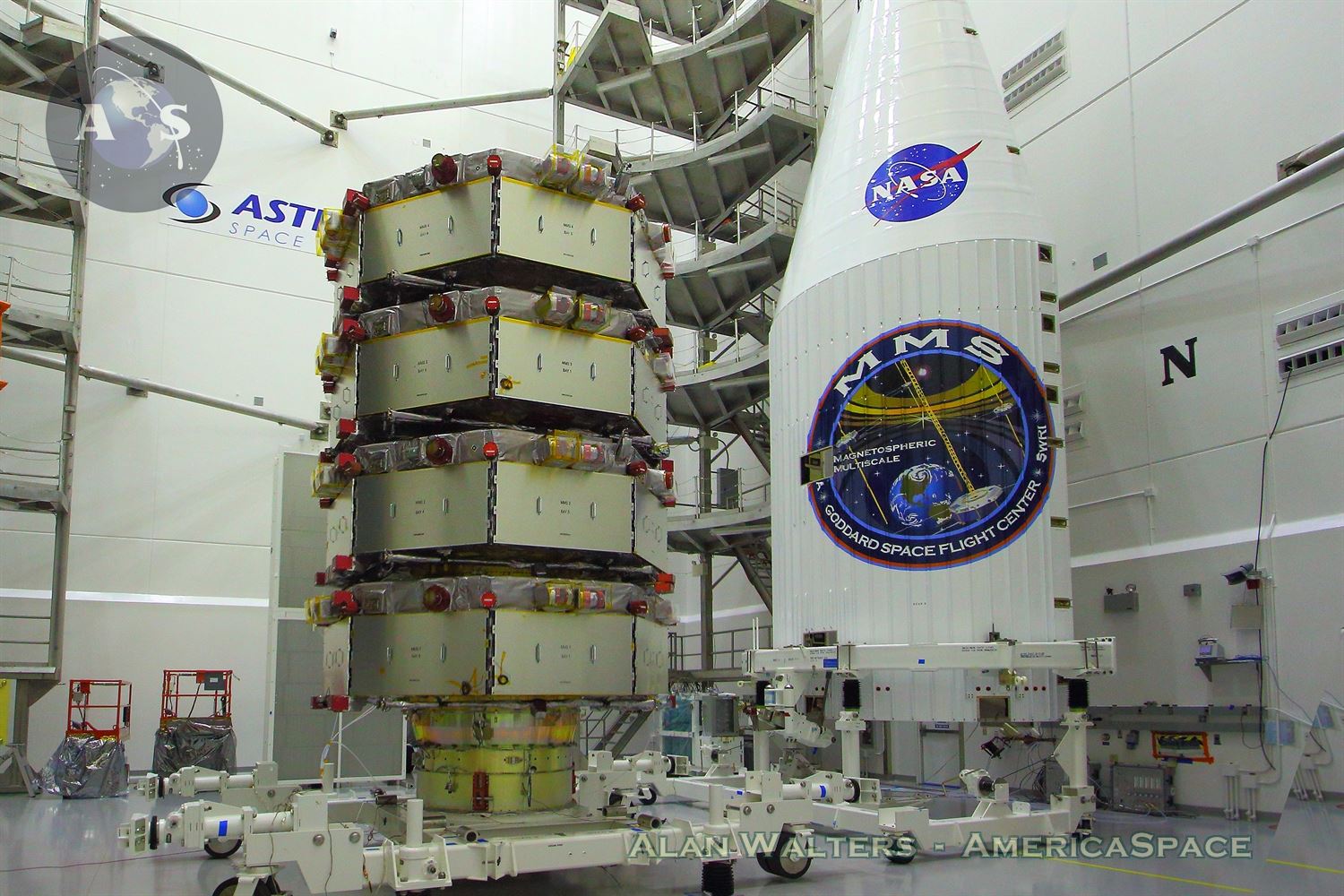 All four of NASA's MMS spacecraft in the clean room at Astrotech Space Operations in Titusville, Fla., completed and stacked for launch atop a ULA Atlas-V rocket as early as March 12, 2015. Photo Credit: Alan Walters / AmericaSpace 