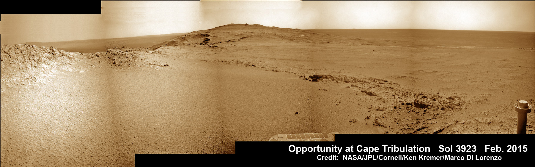 NASA’s Resilient Opportunity Rover Heading to Martian Science Treasure on Feb. 5, 2015.  The rover operates just fine after 11 Years on Mars, despite efforts by Earth-bound budget cutter to “Kill Opportunity!  This brand new view from atop Cape Tribulation was taken just after departing the summit and shows the down slope road ahead to next science destination at Marathon Valley just a few dozen meters away.  This navcam camera photo mosaic was assembled from images taken on Sol 3923 (Feb. 5, 2015) and colorized.  Credit: NASA/JPL/Cornell/Ken Kremer/kenkremer.com/Marco Di Lorenzo