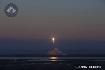 The Falcon 9 v1.1 casts an eeeire glow across the marshy Florida landscape as it spears for the heavens. Photo Credit: Alex Menendez/AmericaSpace