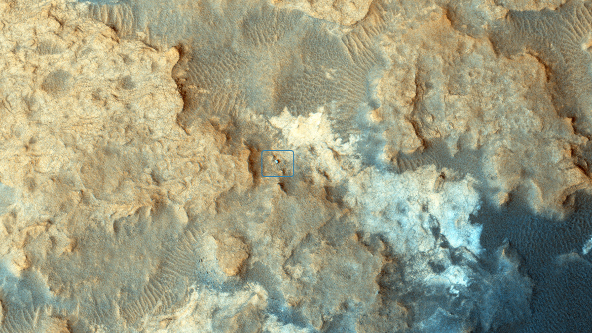 Curiosity Rover at 'Pahrump Hills.'  NASA's Curiosity Mars rover can be seen at the "Pahrump Hills" area of Gale Crater in this view from the High Resolution Imaging Science Experiment (HiRISE) camera on NASA's Mars Reconnaissance Orbiter.  Pahrump Hills is an outcrop at the base of Mount Sharp. The region contains sedimentary rocks that scientists believe formed in the presence of water.  The location of the rover, with its shadow extending toward the upper right, is indicated with an inscribed rectangle.  HiRISE made the observation on Dec. 13, 2014. At that time, Curiosity was near a feature called "Whale Rock." Credit: NASA/JPL-Caltech/Univ. of Arizona