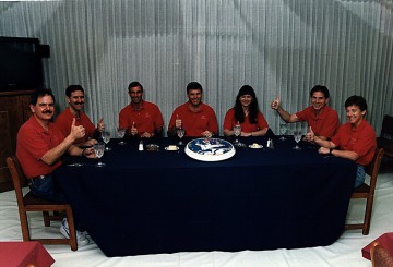 The crew, pictured at the breakfast table, prior to launch. From left to right are Ron Parise, John Grunsfeld, Bill Gregory, Steve Oswald, Tammy Jernigan, Sam Durrance and Wendy Lawrence. Photo Credit: NASA