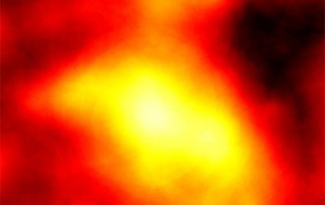 Astronomers have detected an excess of gamma rays (the bright areas in the image), coming from the direction of the dwarf galaxy Reticulum 2, which might be the result of dark matter annihilation. Image Credit: NASA/DOE/Fermi-LAT Collaboration/Geringer-Sameth & Walker/Carnegie Mellon University/Koushiappas/Brown University