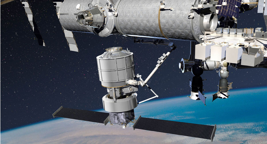 An illustration showing Lockheed Martin’s solution for NASA’s Commercial Resupply 2 Program. This image shows the Jupiter spacecraft, the Exoliner cargo container and the robotic arm docking to the International Space Station.