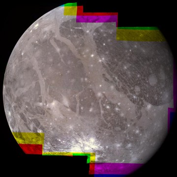 From NASA/JPL: "The hemisphere of Ganymede that faces away from the Sun displays a great variety of terrain. In this Voyager 2 mosaic, photographed at a range of 300,000 kilometers, the ancient dark area of Regio Galileo lies at the upper left. Below it, the ray system is probably caused by water-ice, splashed out in a relatively recent impact." Image Credit: NASA/JPL