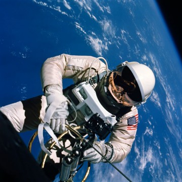 Maneuvering by means of a hand-held propulsion device, Ed White spacewalked across the central Pacific Ocean and the continental United States. Photo Credit: NASA