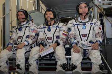 Soyuz TMA-17M crewmembers (from left) Kjell Lindgren, Oleg Kononenko and Kimiya Yui participate in a Soyuz training session. Photo Credit: NASA