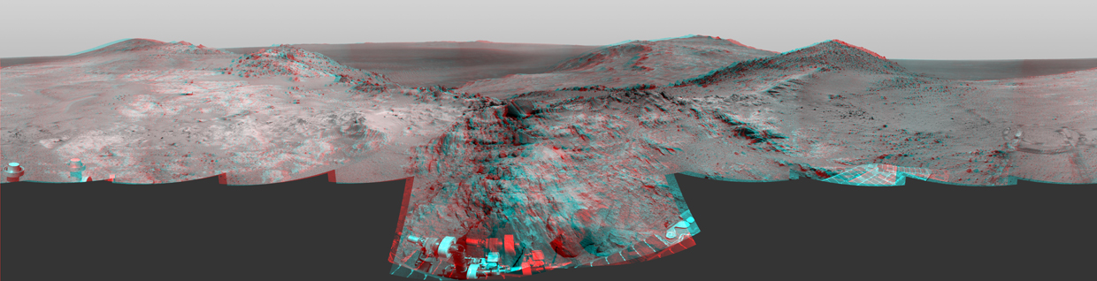 Opportunity's Approach to 'Marathon Valley' (Stereo). Cumulative driving by NASA's Mars Exploration Rover Opportunity surpassed marathon distance on March 24, 2015, as the rover neared a destination called "Marathon Valley," which is middle ground of this stereo view from early March. The scene appears three-dimensional when viewed through blue-red glasses with the red lens on the left.  Olympic marathon distance is 26.219 miles (42.195 kilometers).  Credit:  NASA/JPL-Caltech  