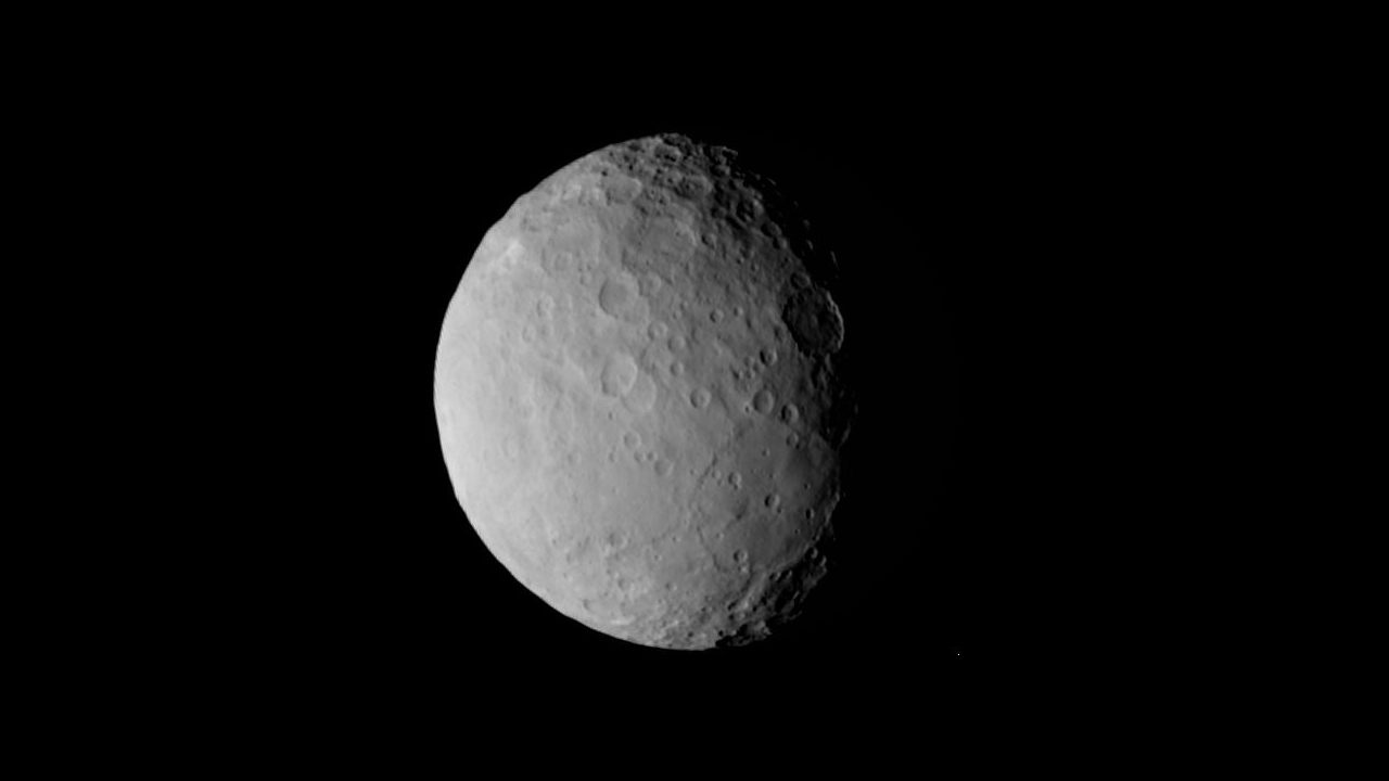 'Pancake' or ‘Sand Dollar’ Feature on Ceres.  Some might see a pancake, and others a sand dollar, in this new image from NASA's Dawn mission. Astronomers are puzzling over a mysterious large circular feature located south of the equator and slightly to the right of center in this view. This basin, nearly 186 miles (300 kilometers) across, is not as deep as would be expected for an impact crater, and appears to contain low-relief mounds.   This image was taken on Feb. 19, 2015 from a distance of nearly 29,000 miles (46,000 kilometers) from Ceres.  Credit: NASA/JPL-Caltech/UCLA/MPS/DLR/IDA