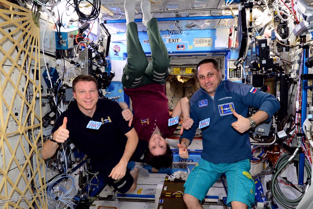NASA astronaut Terry Virts (left) tweeted this photo from the International Space Station earlier this year. Via @AstroTerry on Twitter, "Celebrating flight day 100 with @AstroSamantha and @AntonAstrey"