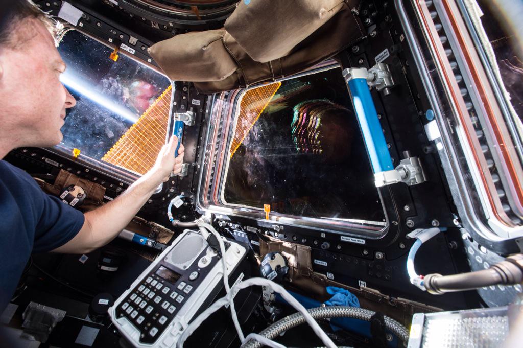 Expedition 43 commander and NASA astronaut Terry Virts working inside the Cupola last week. Photo Credit: NASA / @AstroTerry via Twitter