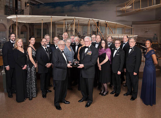 Marine Gen. John "Jack" R. Dailey (front right), director of the National Air and Space Museum, presents the 2015 Current Achievement Trophy Award to William Borucki (front left) and NASA's Kepler Mission Team. Photo Credit: NASM