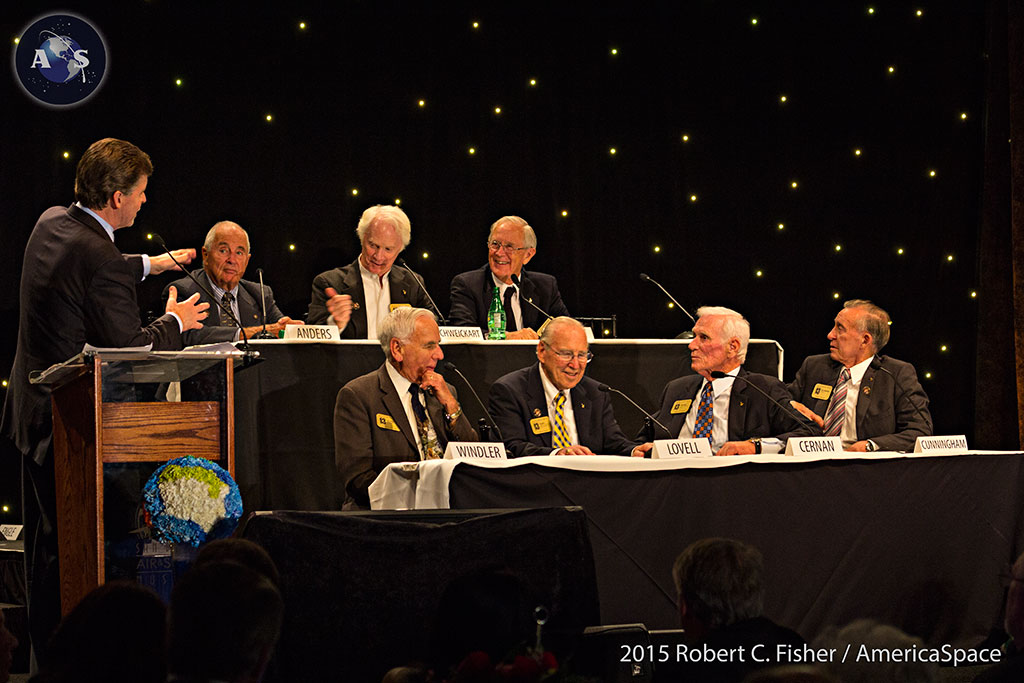 Mark Larson moderates a panel of astronauts including Bill Anders, Rusty Schweickart, Charlie Duke, Fred Haise, Jim Lovell, Gene Cernan, and Walt Cunningham. Photo Credit: Robert C. Fisher / AmericaSpace