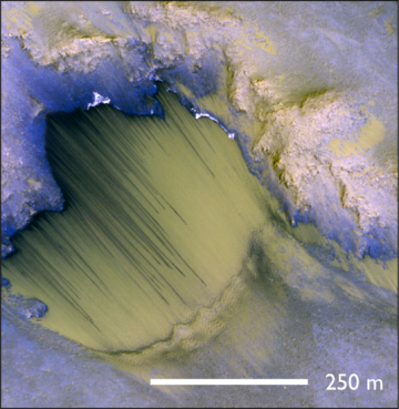A good example of Recurring Slope Lineae in Melas Chasma, thought to be caused by runoff of briny water. Are they related to the buried glaciers? Image Credit: NASA/JPL-Caltech/University of Arizona