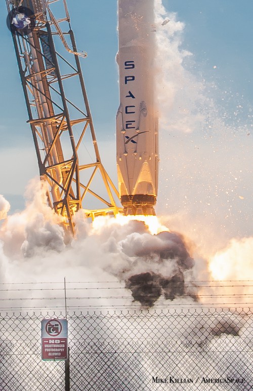 A "photography prohibited" sign displayed in this shot from the pad seconds after liftoff. Photo Credit: Mike Killian / AmericaSpace