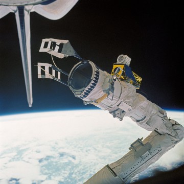 The flyswatter, attached to the end of Discovery's Remote Manipulator System (RMS) mechanical arm. Photo Credit: NASA