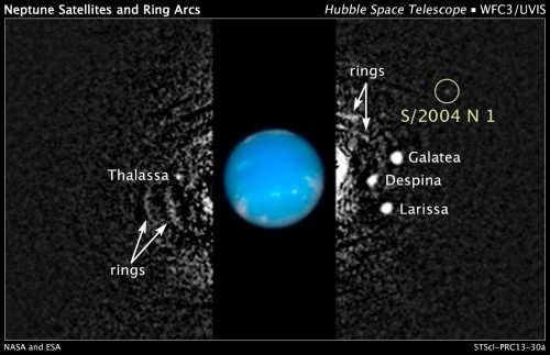This composite image shows the location of the tiny moon S/2004 N 1 that was discovered around Neptune by the Hubble Space Telescope. Image Credit: NASA, ESA, and M. Showalter (SETI Institute)