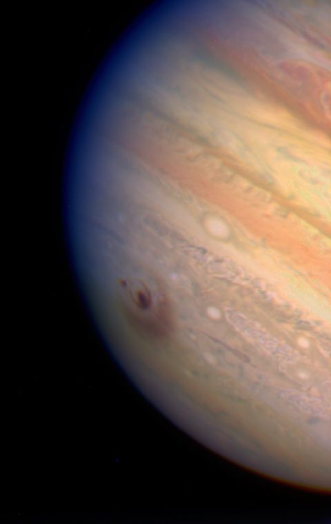 A true color Hubble image of Jupiter, showing the impact sites of two fragments from Comet Shoemaker-Levy 9. Image Credit: H. Hammel, MIT and NASA/ESA