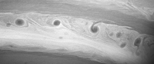 Closer view of one of Saturn's "storm alleys" where the storms stretch out until they encircle the planet. Photo Credit: NASA/JPL-Caltech