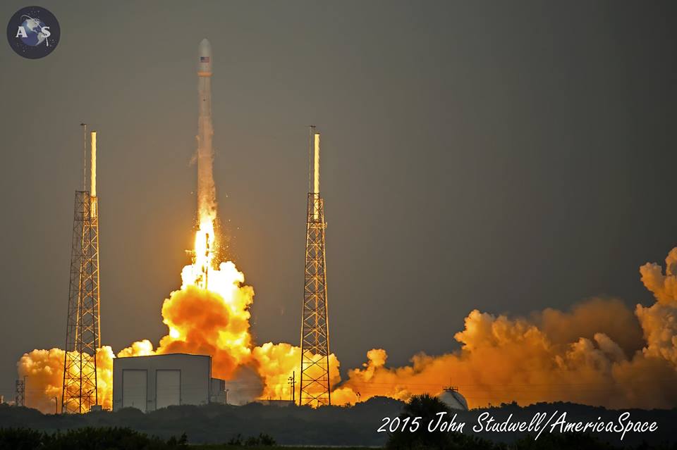 The fifth Falcon 9 v1.1 of 2015 roars into iron-gray skies on Monday, 27 April, 49 minutes into its 90-minute window. Photo Credit: John Studwell/AmericaSpace