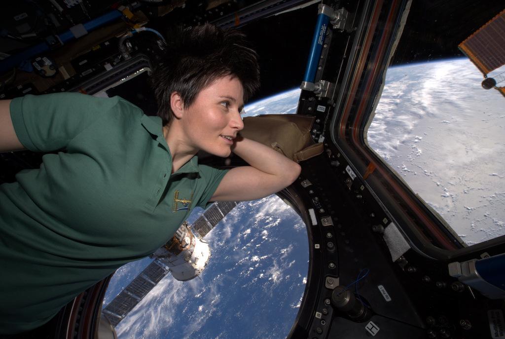 Italian astronaut Samantha Cristoforetti of the European Space Agency (ESA) takes a break to enjoy the view earlier this week. Photo via Twitter @Astro Samantha