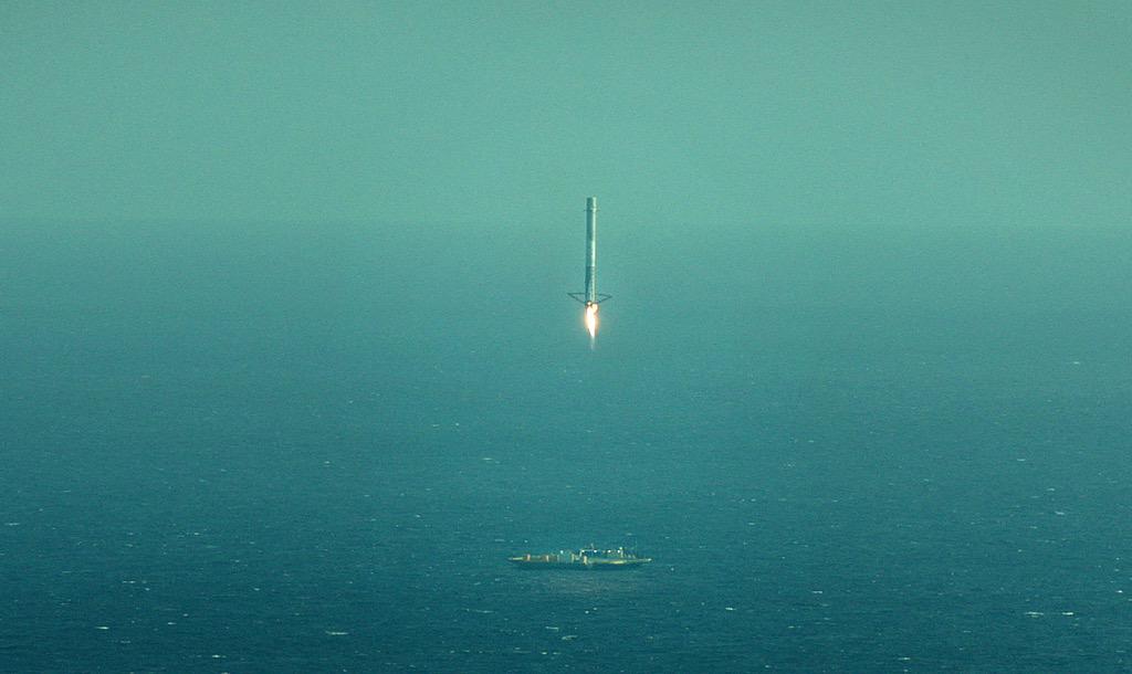 The Falcon-9 CRS-6 first stage booster just before touching down on the company's offshore "Autonomous Spaceport Drone Ship". According to SpaceX leader Elon Musk, the rocket came down with excess lateral velocity, causing it to tip over post landing. Photo Credit: SpaceX via Twitter @ElonMusk