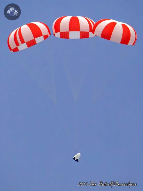 SpaceX's Crew Dragon prototype parachuting back to Earth after a successful Pad Abort Test at Cape Canaveral AFS on May 6, 2015. Photo Credit: John Studwell / AmericaSpace