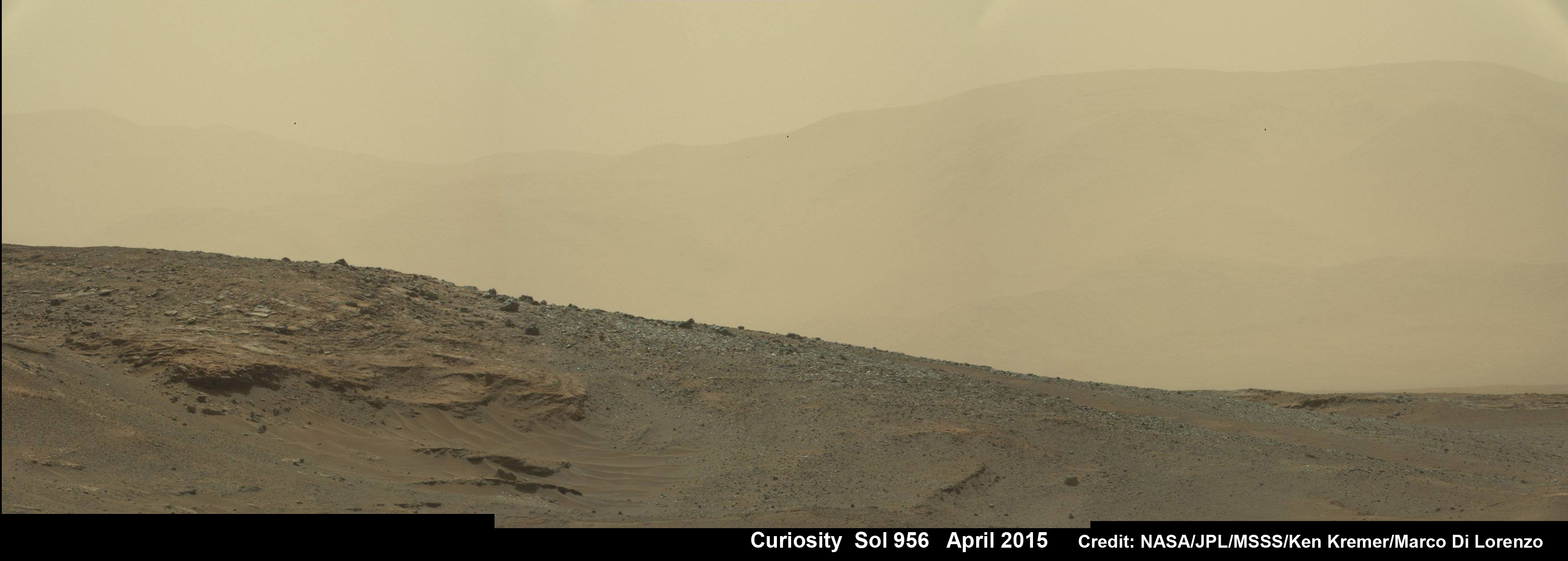 NASA's Curiosity Mars rover recorded this matching daylight view from the same Martian landscape on the same sol as the sunset view taken at the close of the mission's 956th Martian day, or sol (April 15, 2015), from the rover's location in Gale Crater. Credit: NASA/JPL/MSSS/Ken Kremer/kenkremer.com/Marco Di Lorenzo 