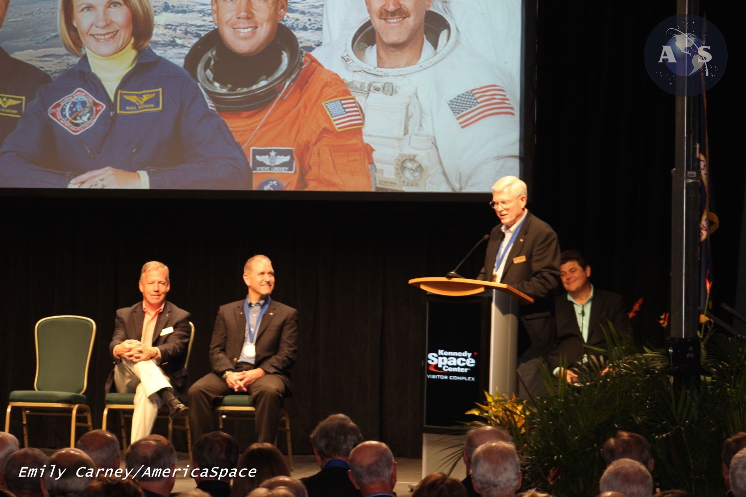 Astronaut Mike Coats (at podium) gives remarks prior to Lindsey's induction (Lindsey is furthest left). Photo Credit: Emily Carney / AmericaSpace 
