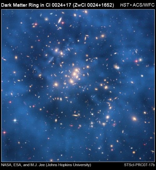 A Hubble Space Telescope composite image showing a ghostly "ring" of dark matter in the galaxy cluster Cl 0024+17. Image Credit: NASA, ESA, M.J. Jee and H. Ford (Johns Hopkins University)