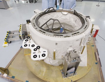 The first International Docking Adapter (IDA-1), highlighting micrometeoroid protection and the three "petals" of its capture mechanism. This was perhaps the most visible payload aboard CRS-7. Photo Credit: NASA