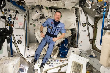 Terry Virts models his "Penguin" suit to prepare his body for the return to terrestrial gravity on 11 June. Virts is pictured inside the Harmony node, with his back to the forward end of the module. Unused as a docking port since the end of the Space Shuttle era, it will soon be given a new lease of life as the primary interface for Commercial Crew vehicles. Photo Credit: NASA