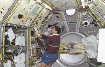 Don Thomas at work aboard the Microgravity Science Laboratory (MSL)-1 module during STS-83. Photo Credit: NASA