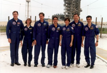Still wearing a cast as he recovers from his broken ankle, Don Thomas (center) poses with the STS-83 crew during the Terminal Countdown Demonstration Test (TCDT). Photo Credit: NASA