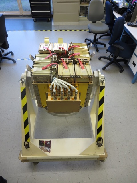 The Naval Post Graduate School "ULTRASat" cubesat dispenser is flying on ASPC-5 attached to the bottom of the Centaur upper stage, where it will deploy LIGHTsat and Navy cubesats. Photo Credit Naval Post Graduate School.