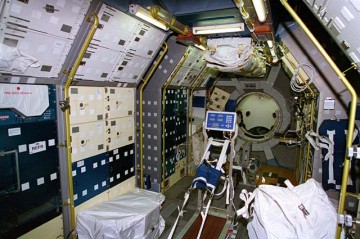 The interior of STS-71's Spacelab-Mir (SL-M), outfitted with research equipment and supplies for the joint mission. Photo Credit: NASA