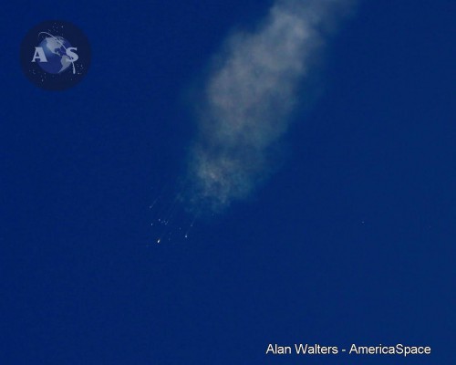 Within a matter of seconds, the Falcon 9 v1.1 was reduced to debris, plunging back to Earth. Photo Credit: Alan Walters/AmericaSpace