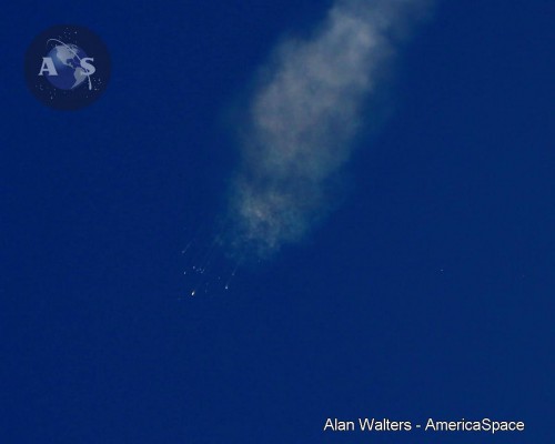 Within a matter of seconds, the Falcon 9 v1.1 was reduced to debris, plunging back to Earth. Photo Credit: Alan Walters/AmericaSpace