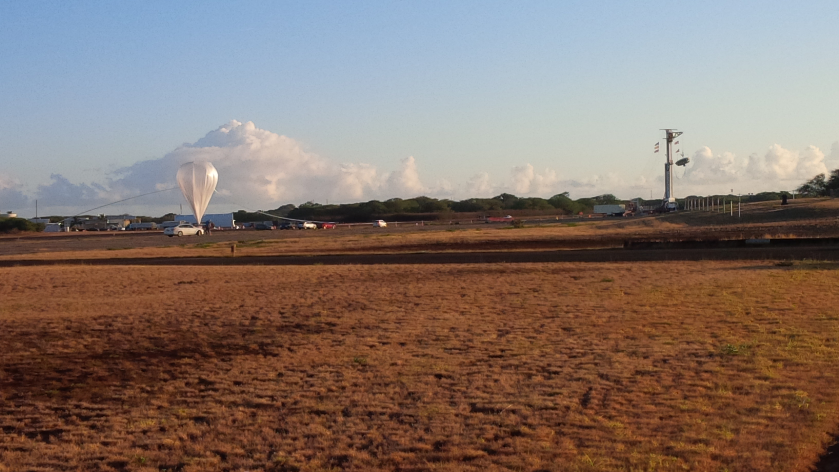 From NASA: "LDSD is proceeding toward launch. The large scientific balloon – 34.4 million cubic feet in volume, has been undoing inflation over the last hour. When launched, the balloon and the test vehicle stand at a towering 980 feet tall." Photo Credit: NASA