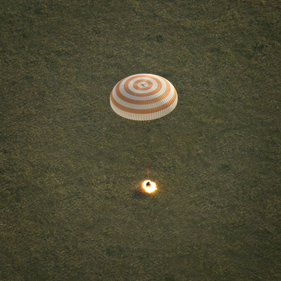 The Soyuz TMA-15M spacecraft is seen as it lands with Expedition 43 commander Terry Virts of NASA, cosmonaut Anton Shkaplerov of the Russian Federal Space Agency (Roscosmos), and Italian astronaut Samantha Cristoforetti from European Space Agency (ESA) near the town of Zhezkazgan, Kazakhstan on Thursday, June 11, 2015. Virtz, Shkaplerov, and Cristoforetti are returning after more than six months onboard the International Space Station where they served as members of the Expedition 42 and 43 crews. Photo Credit: (NASA/Bill Ingalls)