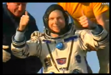 A tired Terry Virts offers a thumbs-up after flying the second longest single space mission ever completed by a U.S. citizen. Photo Credit: NASA
