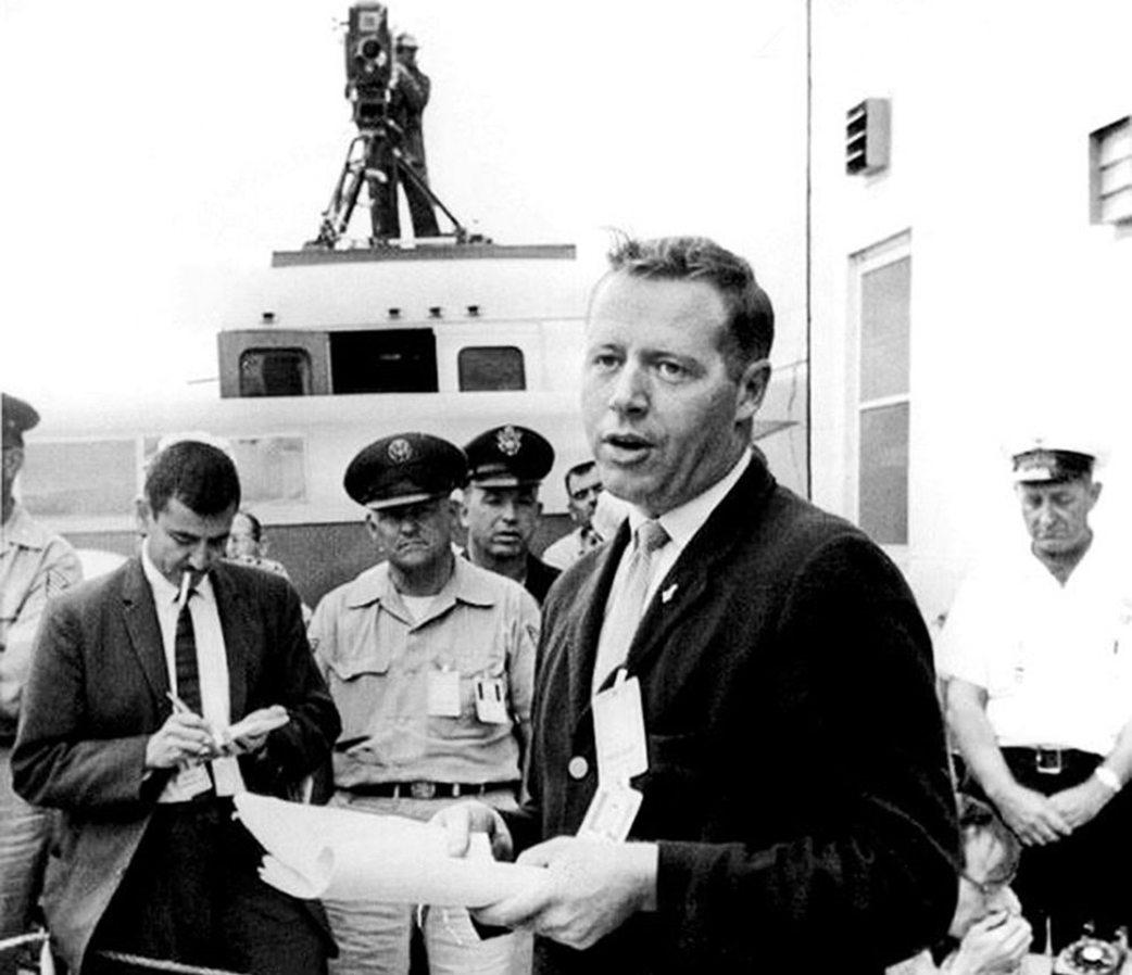 Jack King, the first chief of Public Information for NASA's Launch Operations Center at Cape Canaveral Air Force Station, briefs the news media on the May 2, 1961 postponement of the launch of Mercury Redstone-3 due to unfavorable weather. Three days later, astronaut Alan Shepard made history as the first American in space. Credits: The "Voice of Apollo", Jack King passed away at age 84 due to congestive heart failure. Photo Credit: NASA