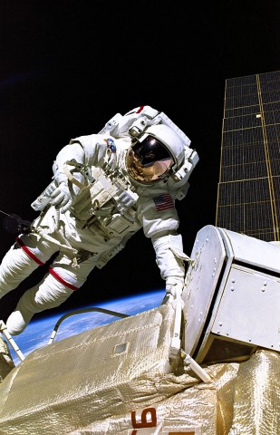 Jerry Ross works outside the nascent International Space Station (ISS) during STS-88. Photo Credit: NASA
