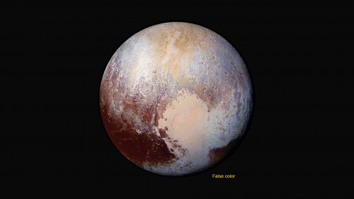 Four images from New Horizons’ LORRI camera were combined with color data from the Ralph instrument to create this enhanced color global view of Pluto. The images, taken when the spacecraft was 450,000 kilometers away, show features as small as 2.2 kilometers, twice the resolution of previous images. Image Credit/Caption: NASA/Johns Hopkins University Applied Physics Laboratory/Southwest Research Institute