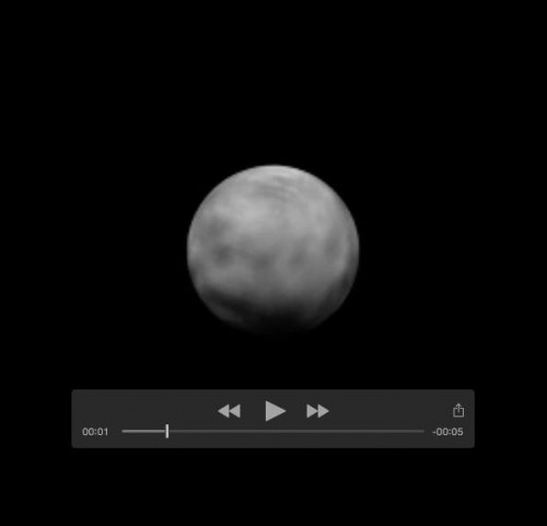 Still frame from Pluto rotation animation showing the four dark spots along the equator. Image Credit: NASA/Johns Hopkins University Applied Physics Laboratory/Southwest Research Institute/Björn Jónsson