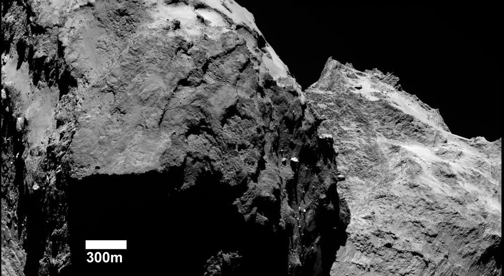 From ESA: " This image focuses on Apis and Atum regions on Comet 67P/Churyumov–Gerasimenko’s large lobe in the foreground, with parts of the small lobe in the background.  The image is a mosaic of two OSIRIS narrow-angle camera images. The images were acquired on 5 September 2014 when Rosetta was about 40 km from the surface of the comet." ESA recently released crops of Comet 67P/Churyumov–Gerasimenko’s boundary regions. Image Credit: ESA/Rosetta/MPS for OSIRIS Team MPS/UPD/LAM/IAA/SSO/INTA/UPM/DASP/IDA
