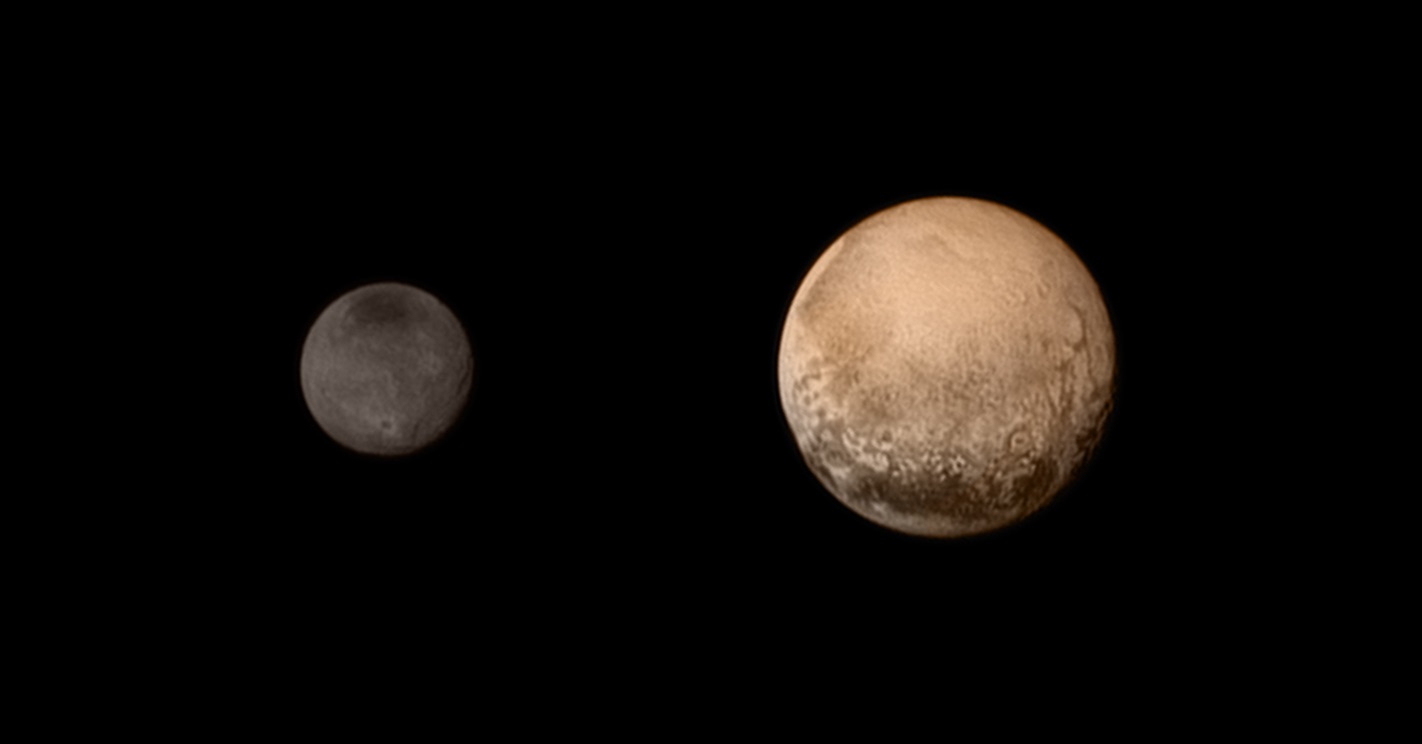 A portrait from the final approach. Pluto and Charon display striking color and brightness contrast in this composite image from July 11, showing high-resolution black-and-white LORRI images colorized with Ralph data collected from the last rotation of Pluto. Color data being returned by the spacecraft now will update these images, bringing color contrast into sharper focus. Credits: NASA-JHUAPL-SWRI