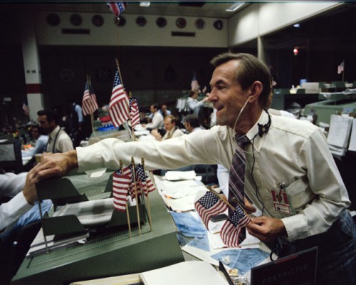 STS-4 Flight Director Charles Lewis is congratulated by an unidentified colleague in the Mission Control Center (MCC) at the Johnson Space Center (JSC) in Houston, Texas, on 4 July 1982. Photo Credit: NASA