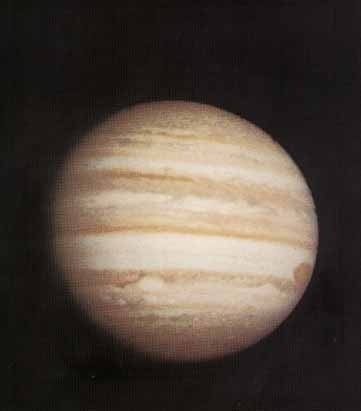 Jupiter, with the Great Red Spot visible at the limb on the far right side, as seen by Pioneer 10. Photo Credit: NASA